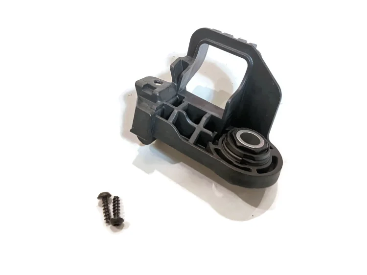 657 998 226 a Uchwyt wspornik ucho lampy przedniej reflektora od strony atrapy SKODA Scala Rapid