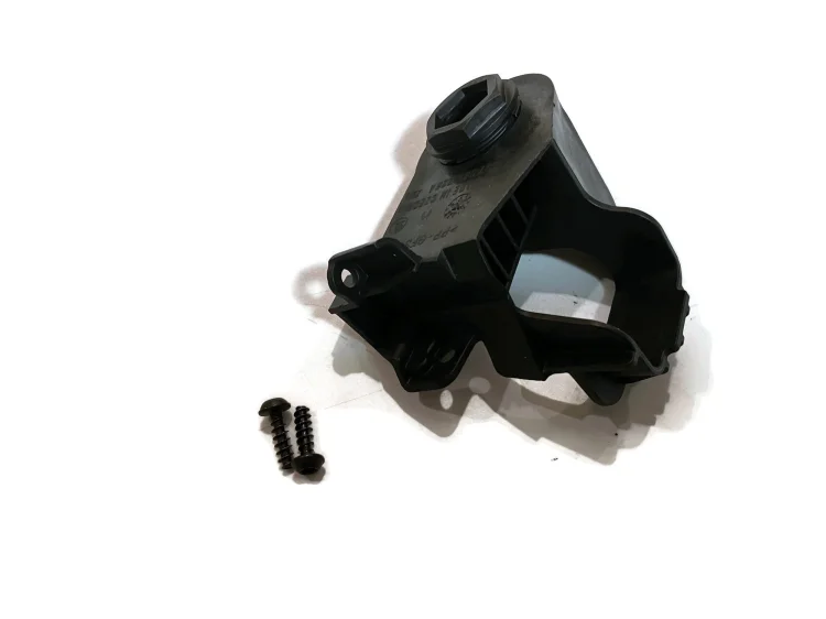 657998226a Uchwyt wspornik ucho lampy przedniej reflektora od strony atrapy SKODA Scala Rapid