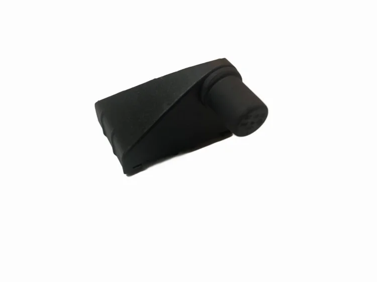Uchwyt wspornik półki tylnej bagażnika LEWY VW Caddy 2004-2020 2K0863533