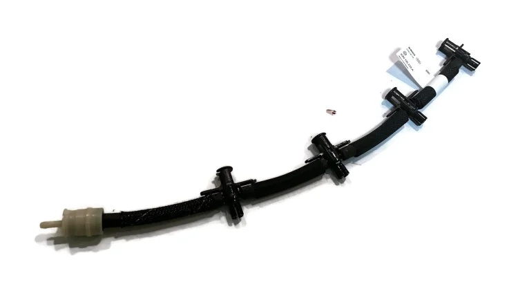 03N 130 235 A Fuel return line  overflow hose